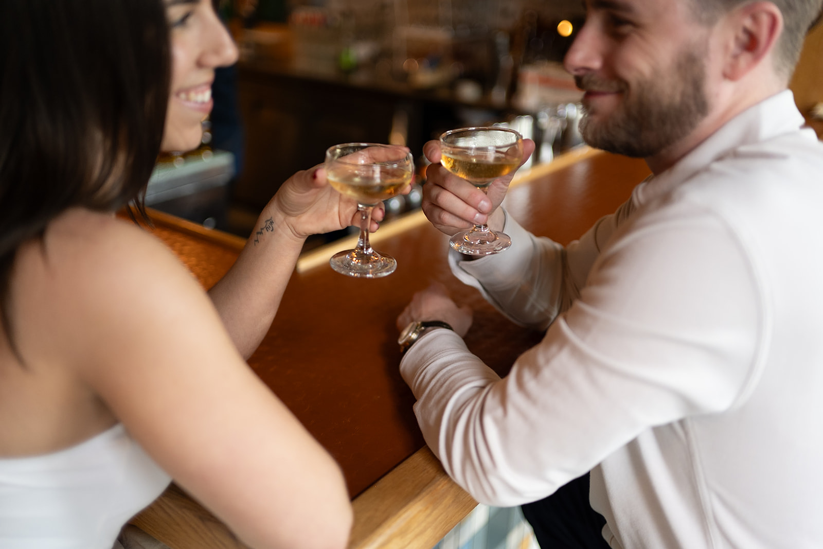 Couple enjoying drinks for their bar engagement photos at Jane Jane in Washington DC