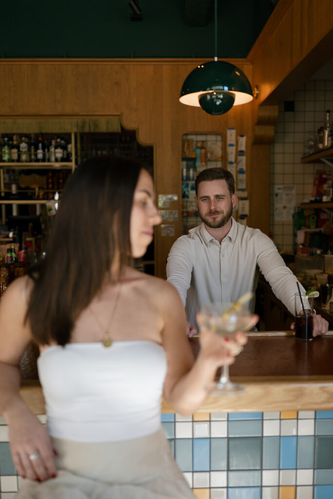 Editorial engagement photos of a couple posing at Jane Jane
