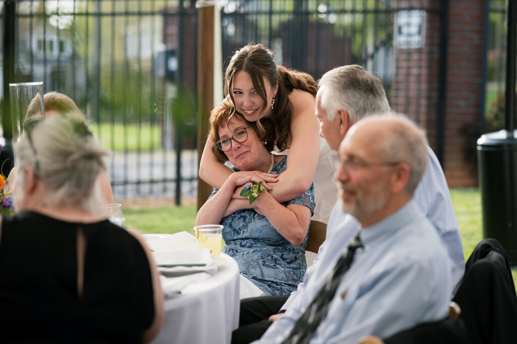 Bride hugging her mother