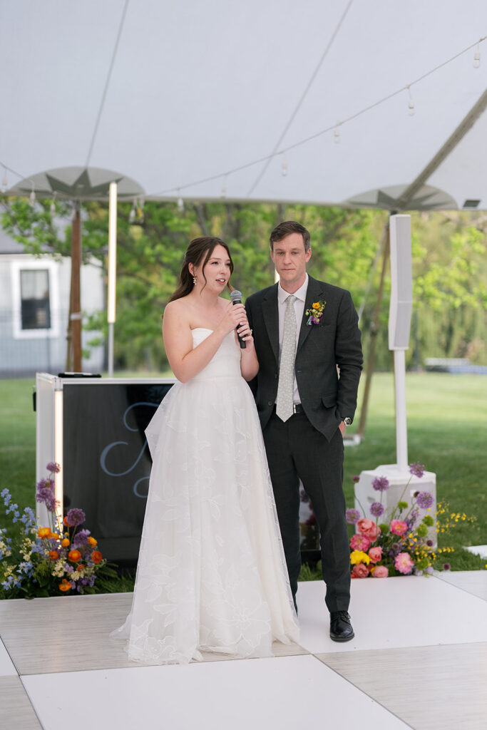 Bride and groom giving a speech