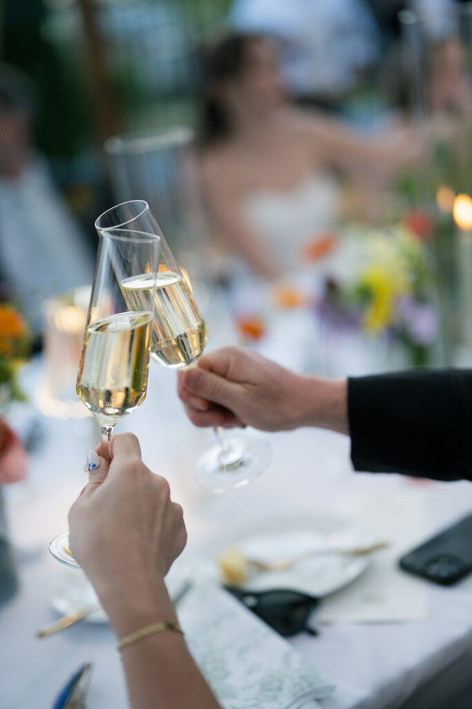 Guests toasting champagne during speeches