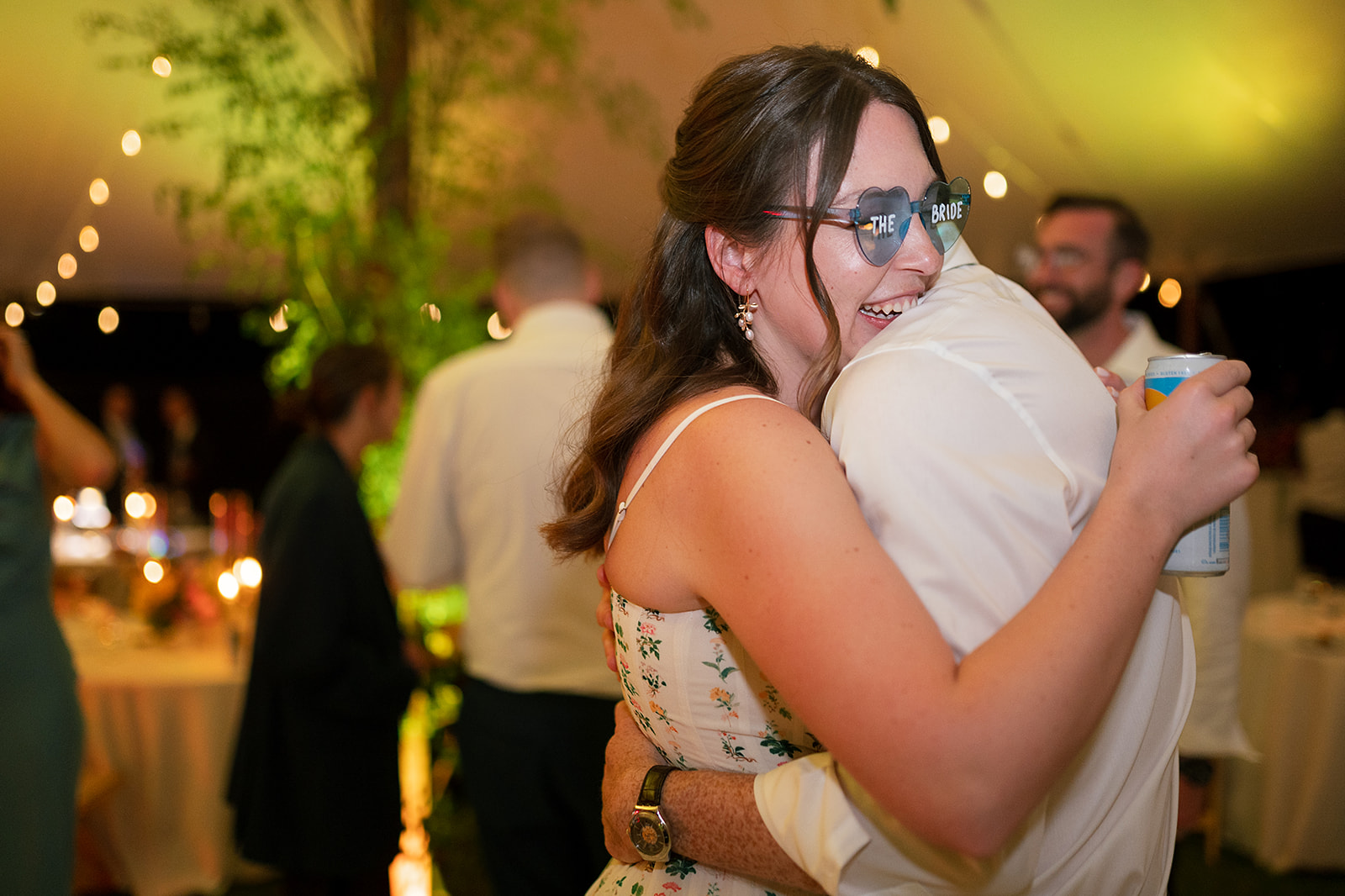 Bride and groom hugging during the reception