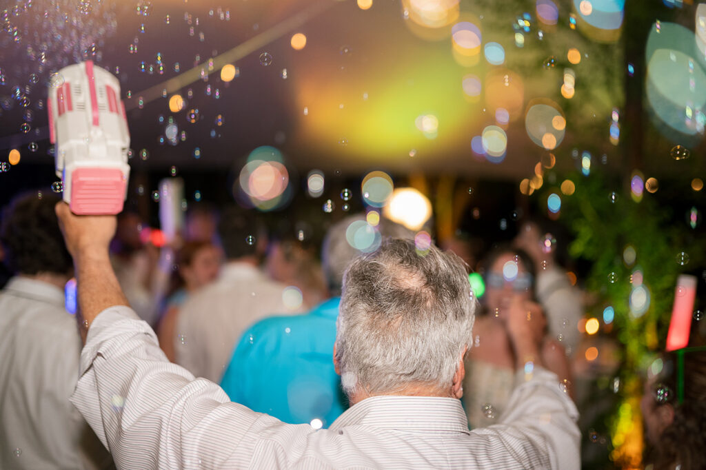 Guy with a bubble gun during the reception