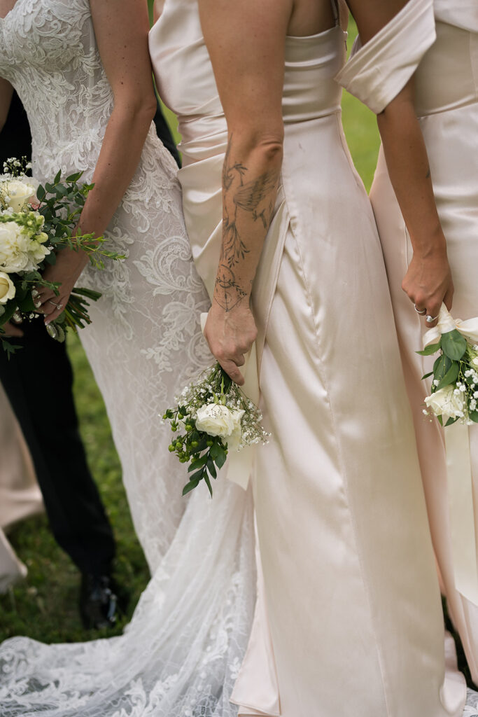Close up shot of a bride standing with her bridesmaids