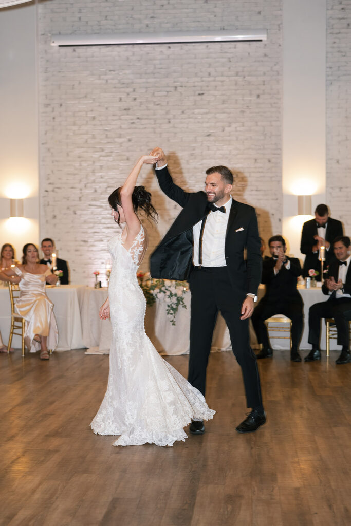 Bride and groom dancing during their Daniel's Vineyard wedding reception in the Upper Ballroom