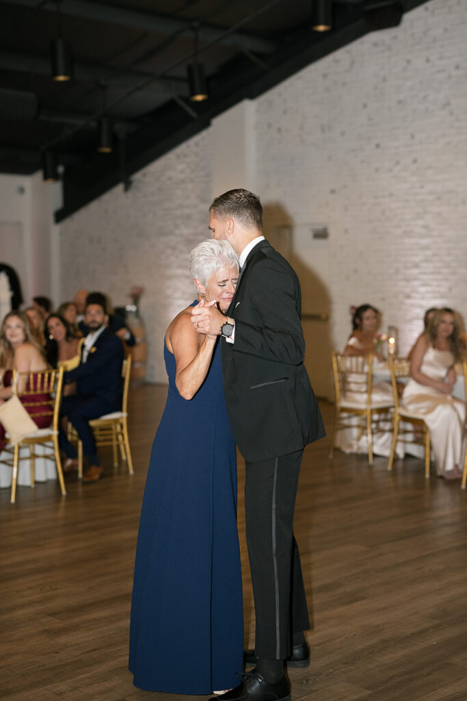 Groom dancing with his mother