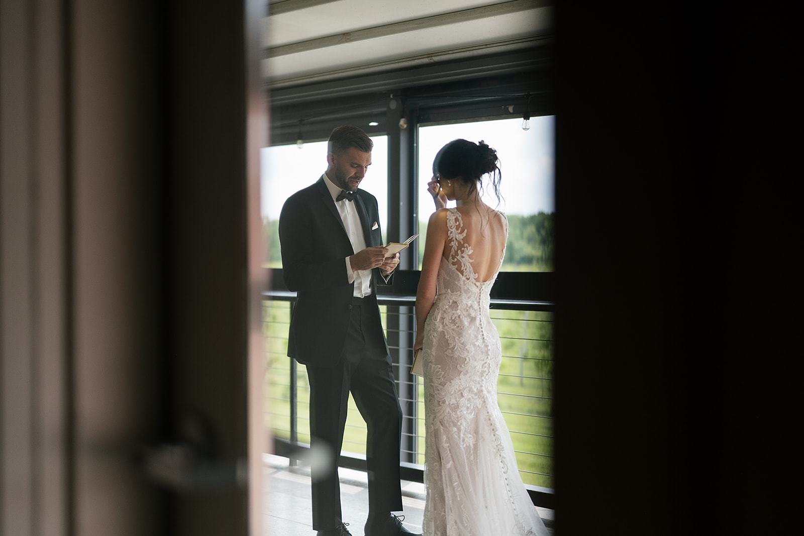 Bride and groom getting emotional as they share private vows