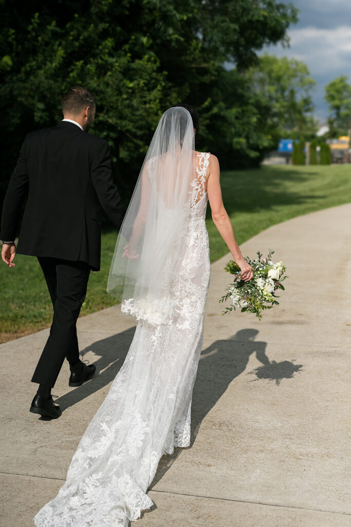 Bride and groom walking back down the aisle as husband and wife after their Daniel's Vineyard wedding ceremony