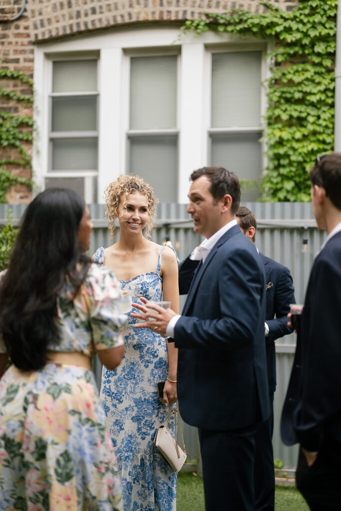 Guests mingling during cocktail hour at Firehouse Chicago